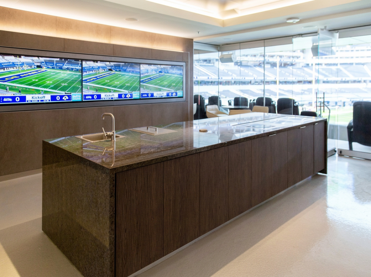 VIP suite interior with stone island bar and stadium views